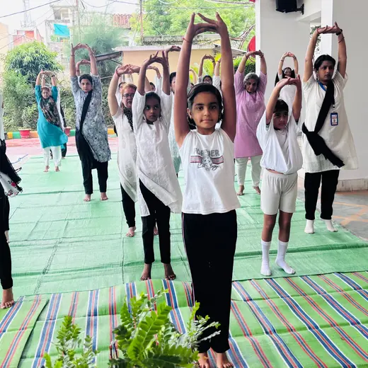 School session: standing stretches, June 2025