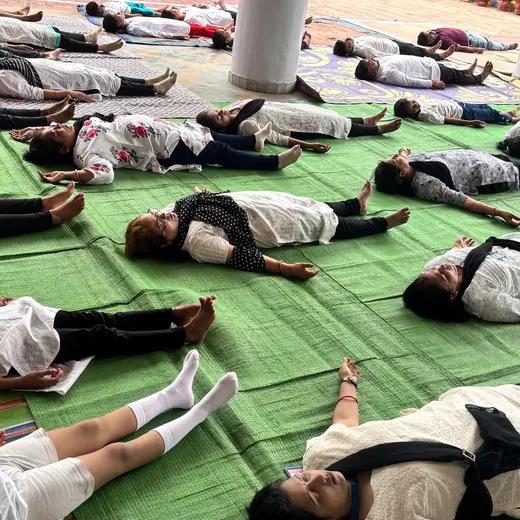 School session: students resting in Shavasana, June 2025