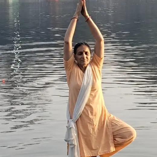 Tree pose standing in the river, June 2026
